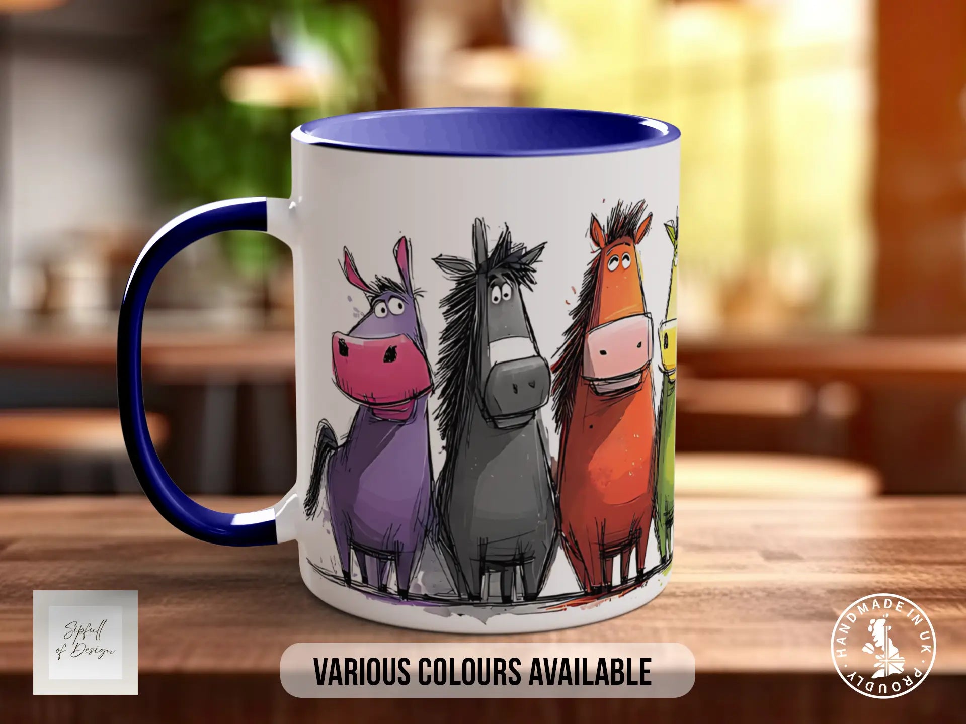 A white mug with a blue rim, featuring a cartoon illustration of four colorful cartoon horses.