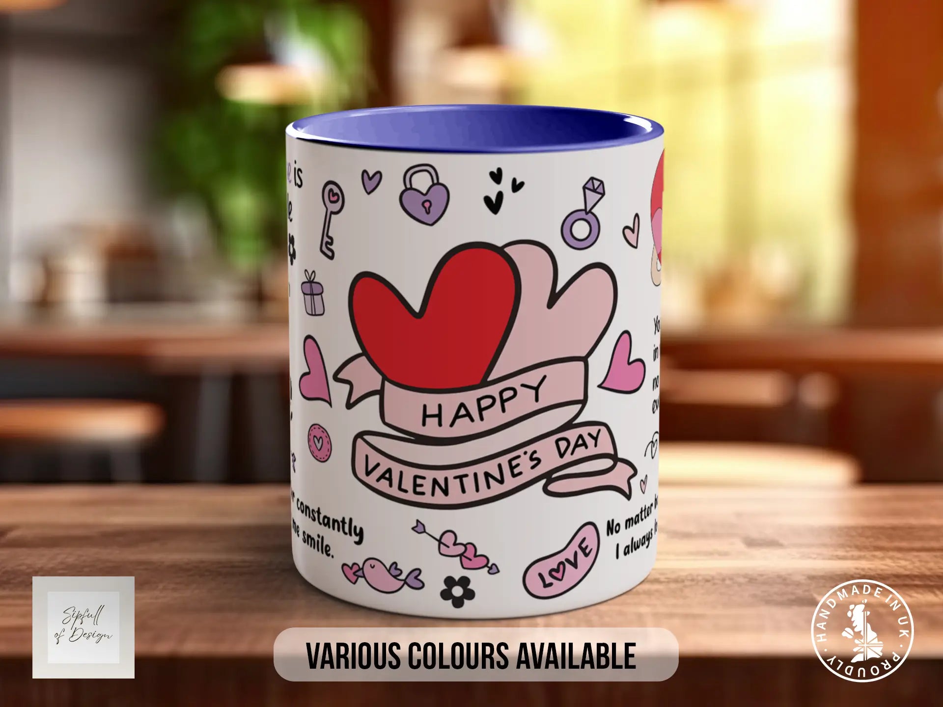 A white mug with a blue interior, featuring a design with hearts, a key, and the text "Happy Valentine's Day" along with other decorative elements.