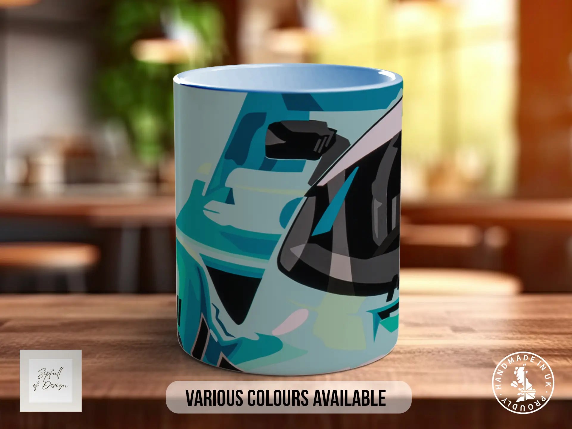 A colorful mug with a graphic design on it, placed on a wooden surface.
