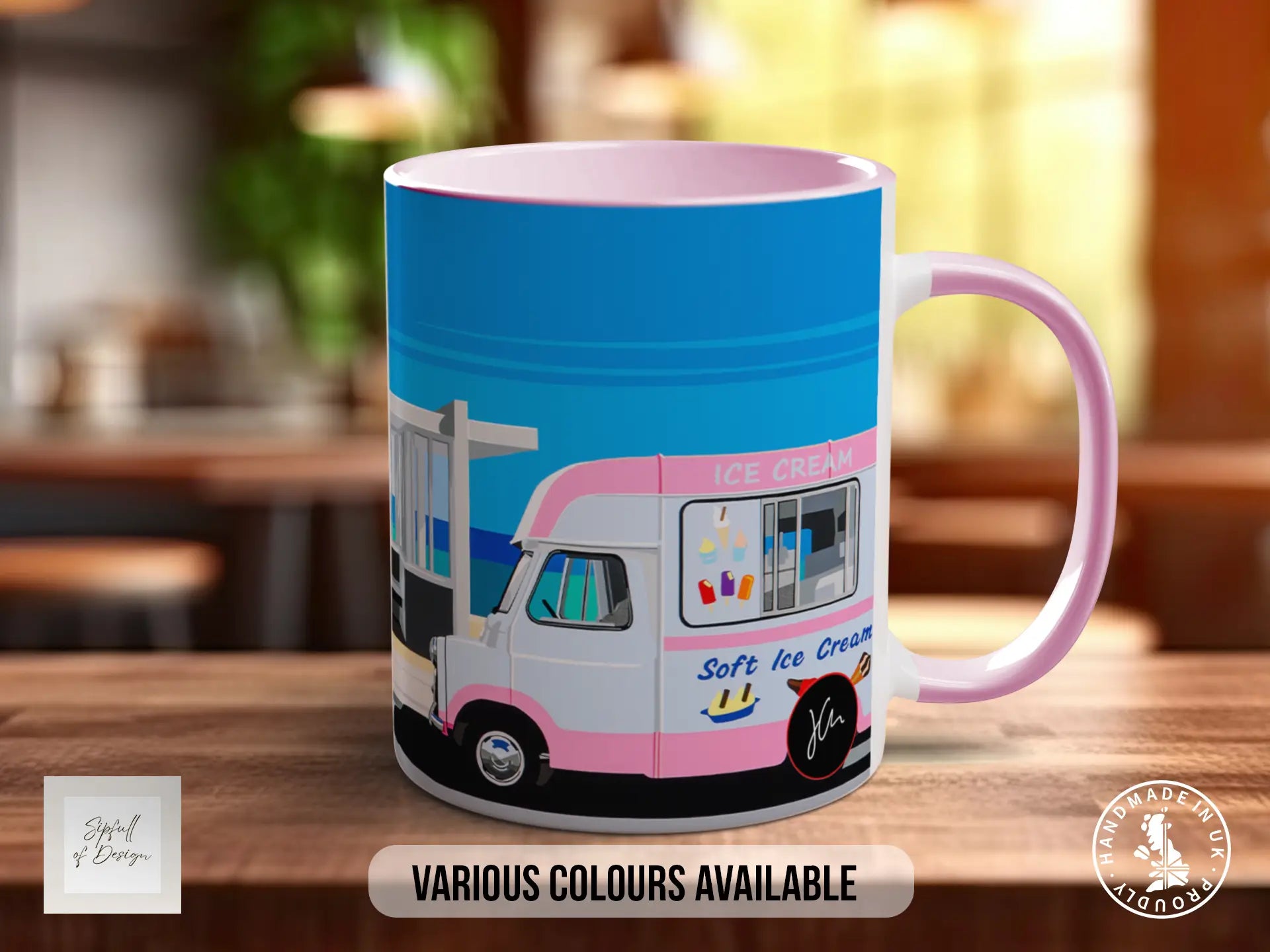 A mug with an illustration of an ice cream truck on it, placed on a wooden surface.