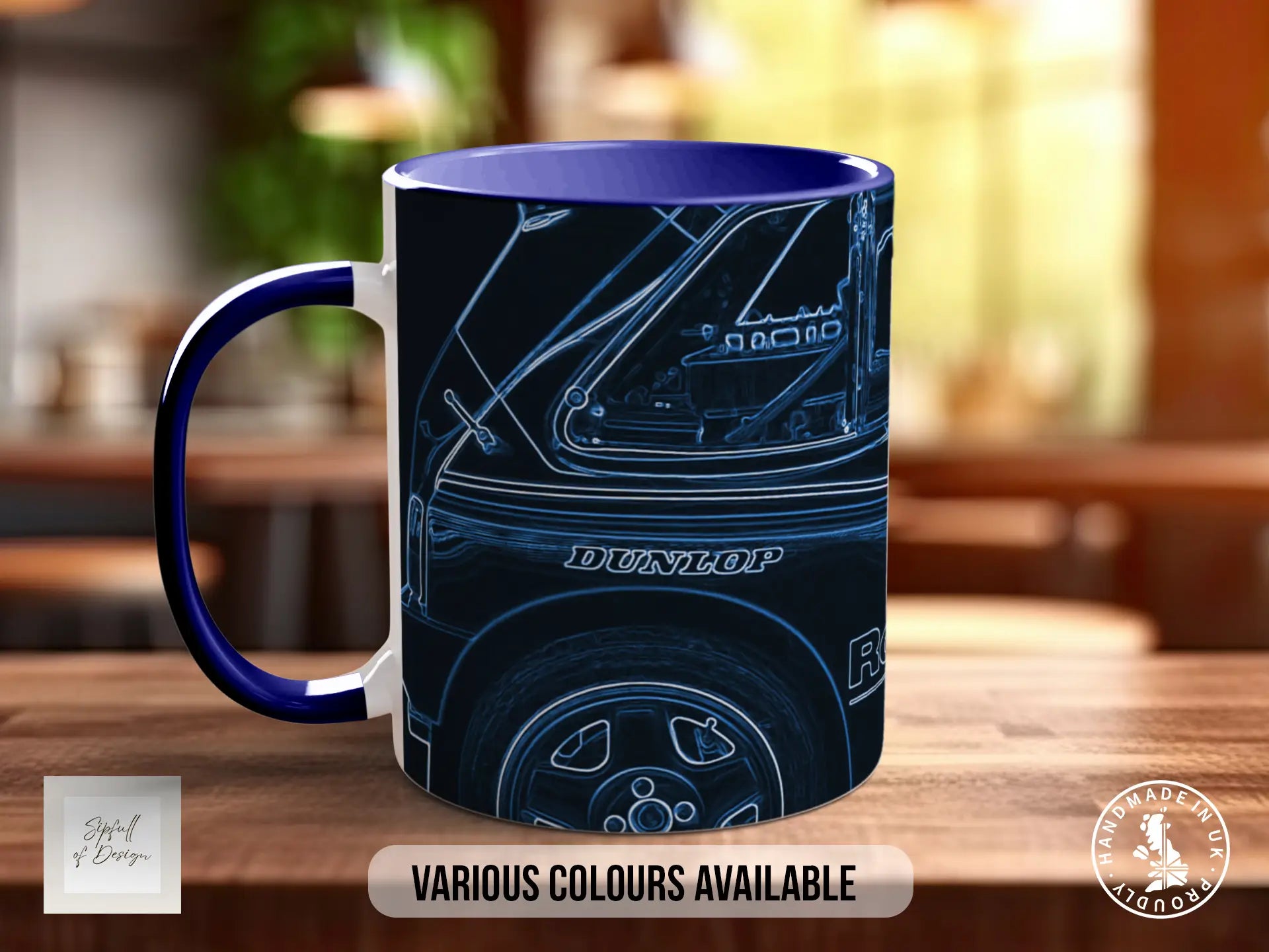 A blue and white mug with a graphic of a car on it, placed on a wooden surface.