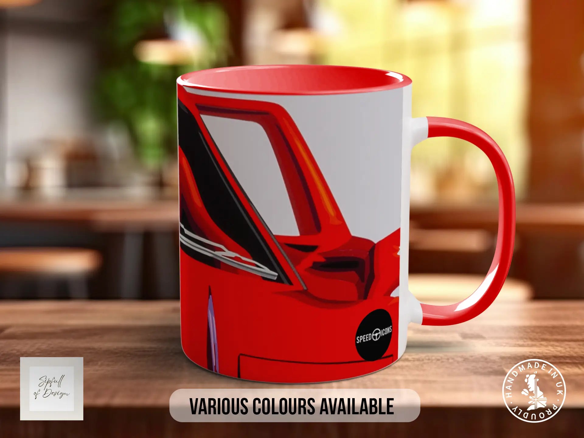 A red and white mug with a graphic of a car on it, placed on a wooden surface.