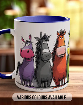 A white mug with a blue rim, featuring a cartoon illustration of four colorful cartoon horses.