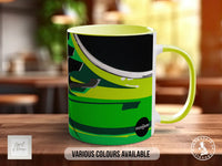 A colorful mug with a graphic design on it, placed on a wooden surface.