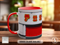 A red and white mug with the word "FUN" printed on it, sitting on a wooden surface.