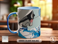 A blue and white mug with a graphic design on it, sitting on a wooden surface.