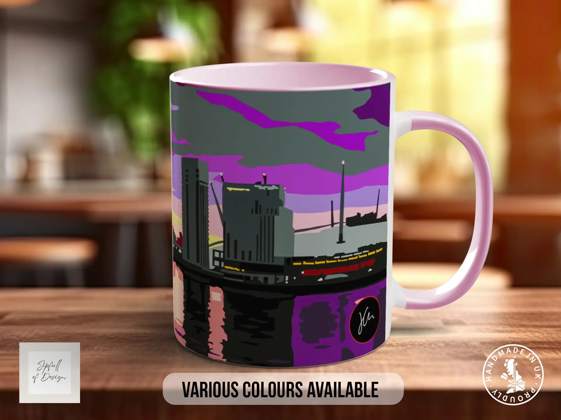 A mug with a colorful illustration of a cityscape, featuring a mix of purple, gray, and black tones.
