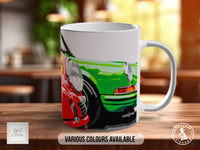 A white ceramic mug with a colorful illustration of a car on it, placed on a wooden surface.