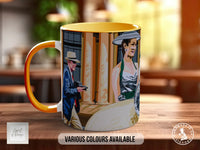 A colorful mug with an illustration of a man and a woman, along with the text "Various colors available" and "Handmade in UK".