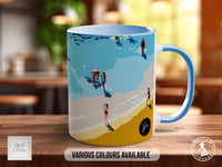 A mug with a beach scene printed on it, featuring people enjoying the beach and the ocean.