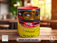 A mug with a racing helmet design on it, featuring the words "V-Power" and "VistaJet" printed on it.