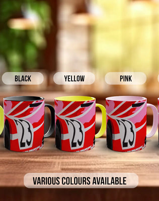 a row of five colorful mugs, each with a different color, arranged on a wooden surface.