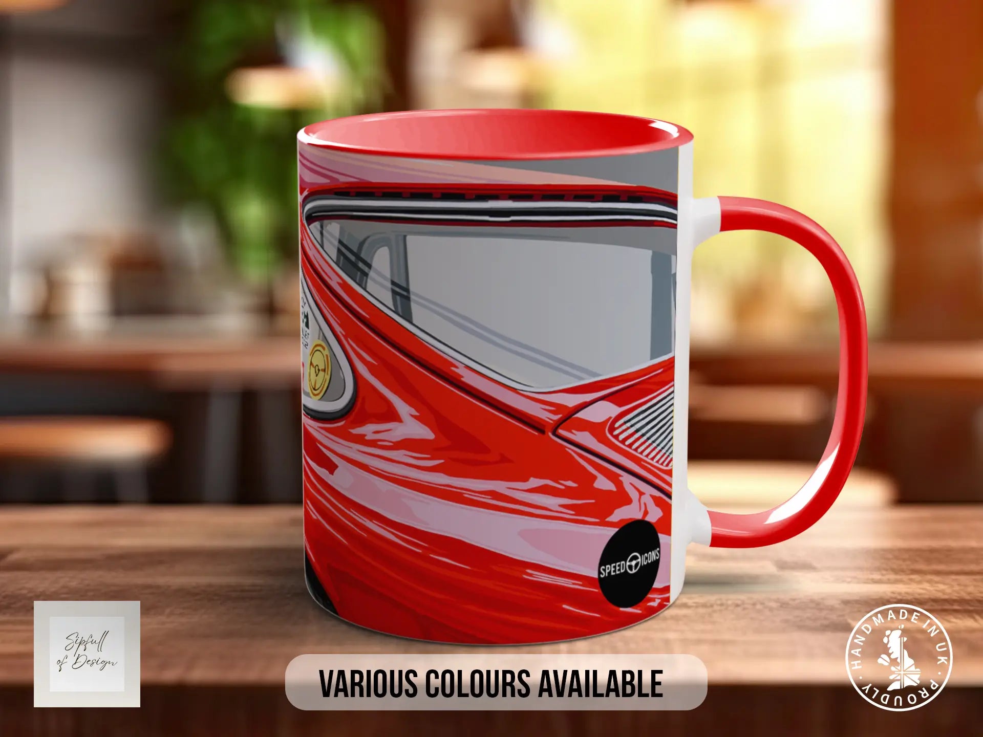A red and white mug with a graphic of a car on it, placed on a wooden surface.
