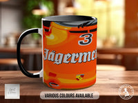 A mug with a colorful design featuring a Jägermeister logo and the number 3.