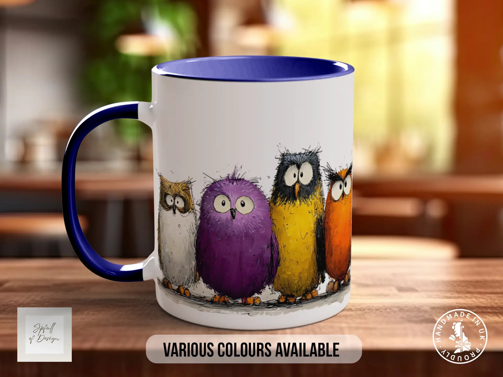 A white mug with a blue rim, featuring a colorful illustration of four cartoon owls in various colors.