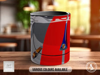 A red and gray mug with a graphic design featuring a car and a motorcycle, along with the text "Various Colours Available" and "Handmade in UK".