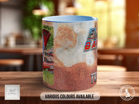 A ceramic mug with a rust-colored design featuring a car and the text "FLY BAYS" in the background.