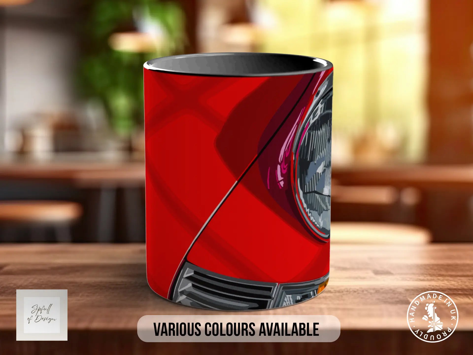 A red mug with a close-up image of a car's headlight on it, sitting on a wooden surface.
