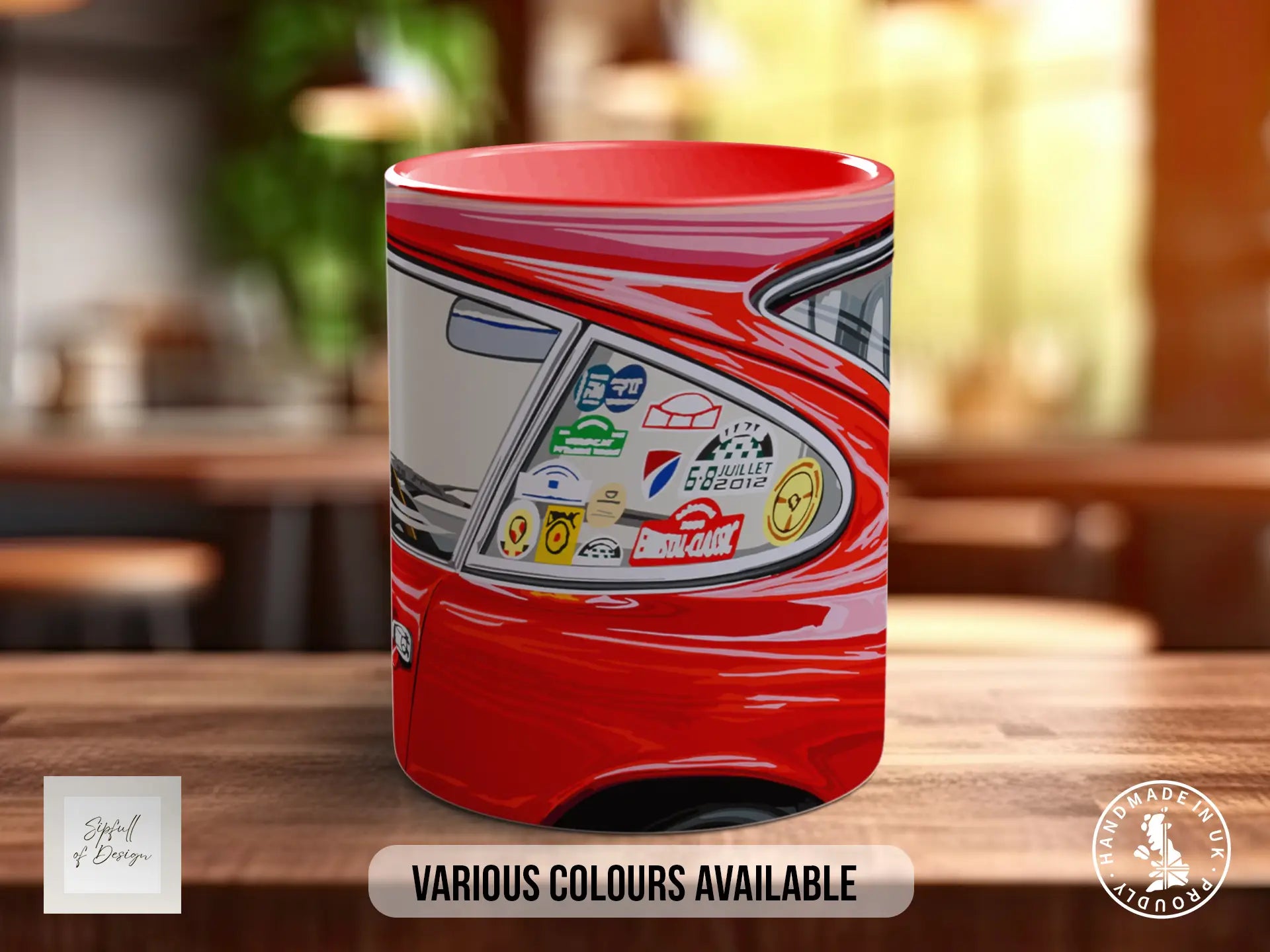 A red mug with a car decal on it, sitting on a wooden surface.