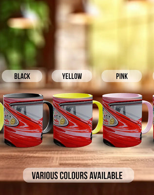 a row of five colorful mugs, each with a different color: green, black, yellow, pink, and white.