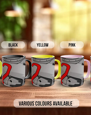 a row of five mugs with different colors, including green, black, yellow, pink, and white.
