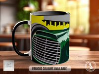 A black and white mug with a colorful graphic design featuring a car and a city skyline.