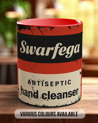 A red and white mug with the text 