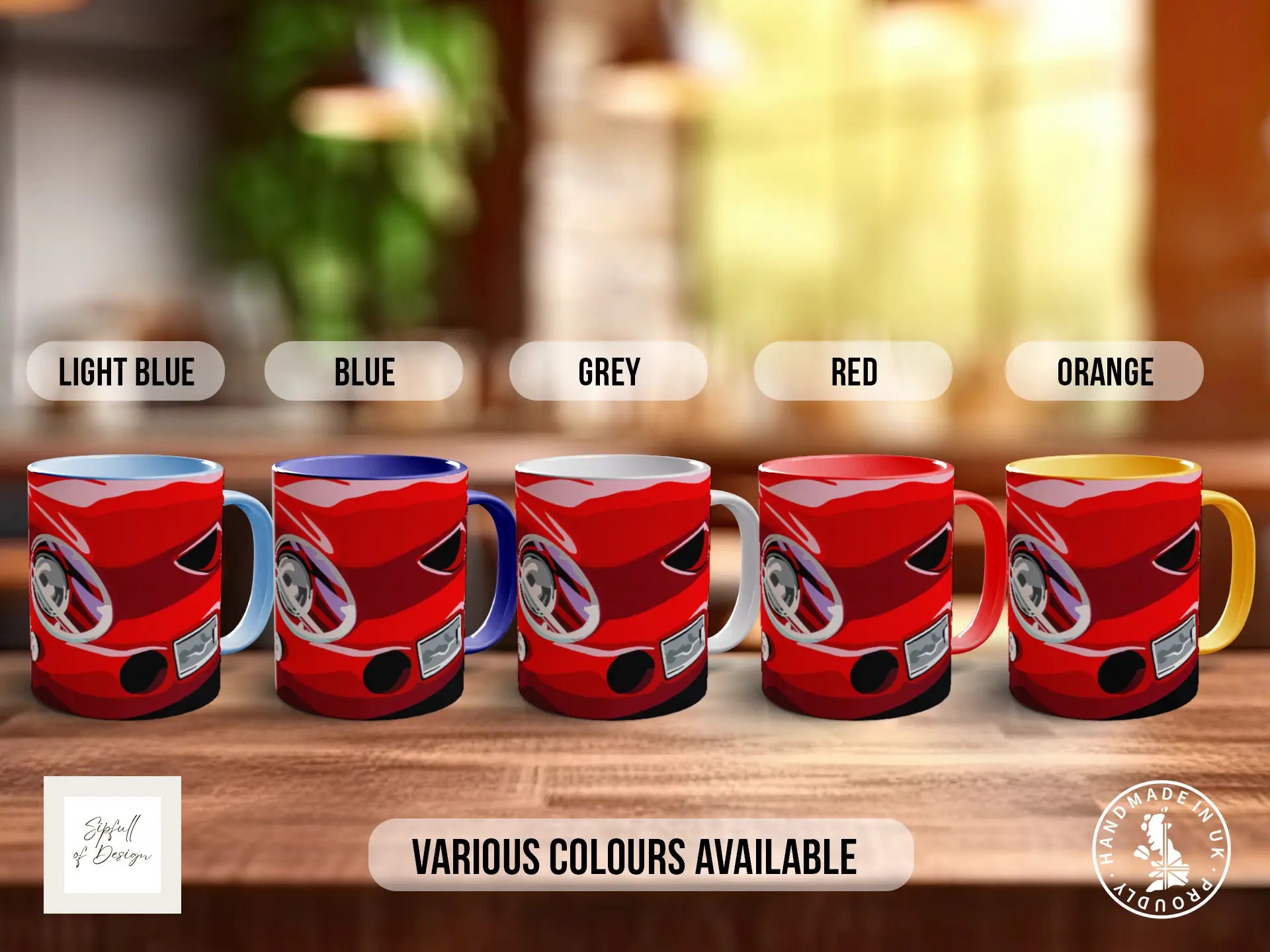 five red mugs with different colors, including light blue, blue, grey, red, and orange, arranged on a wooden surface.