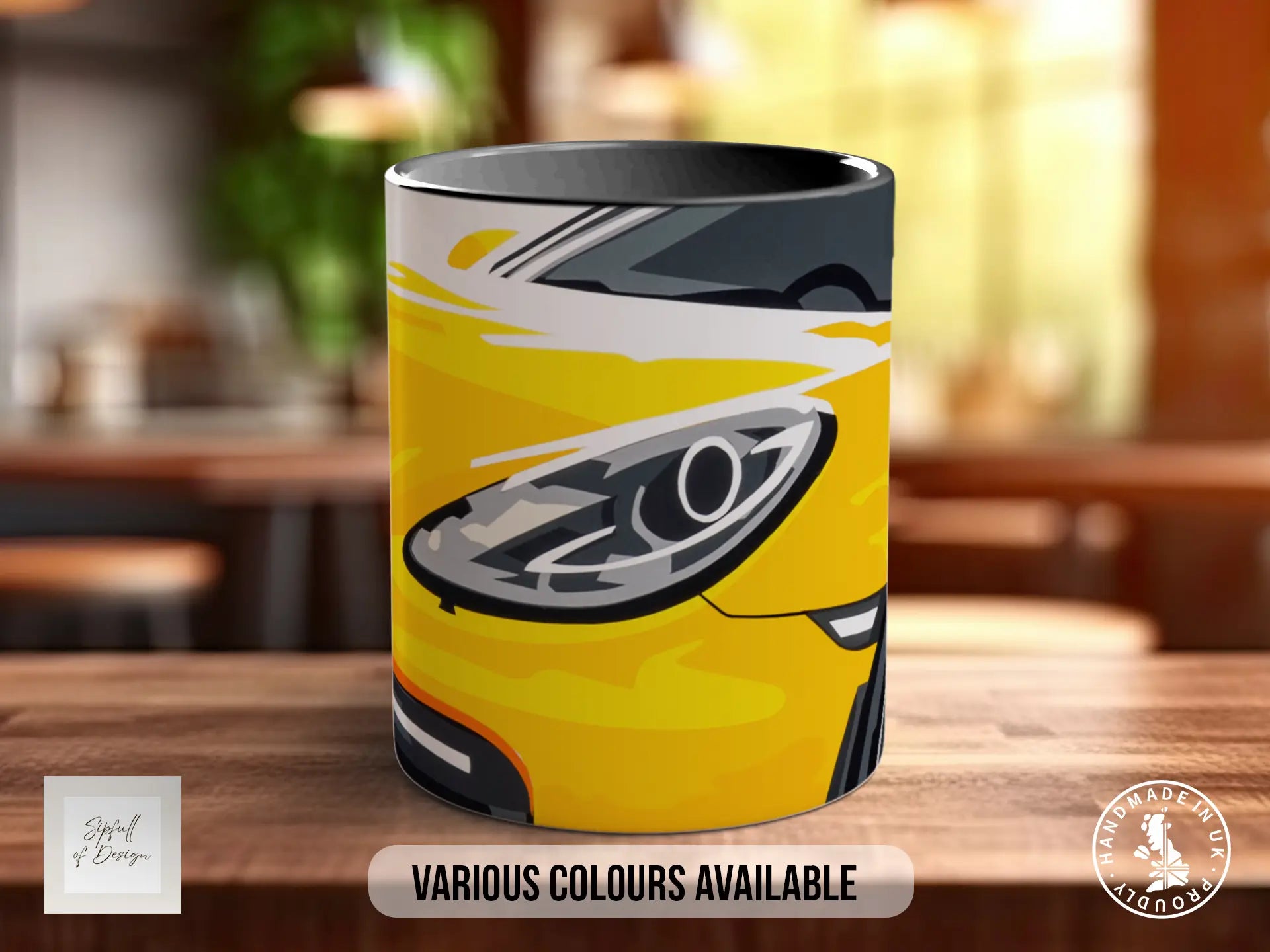 A yellow and black mug with a stylized car head design on it, placed on a wooden surface.