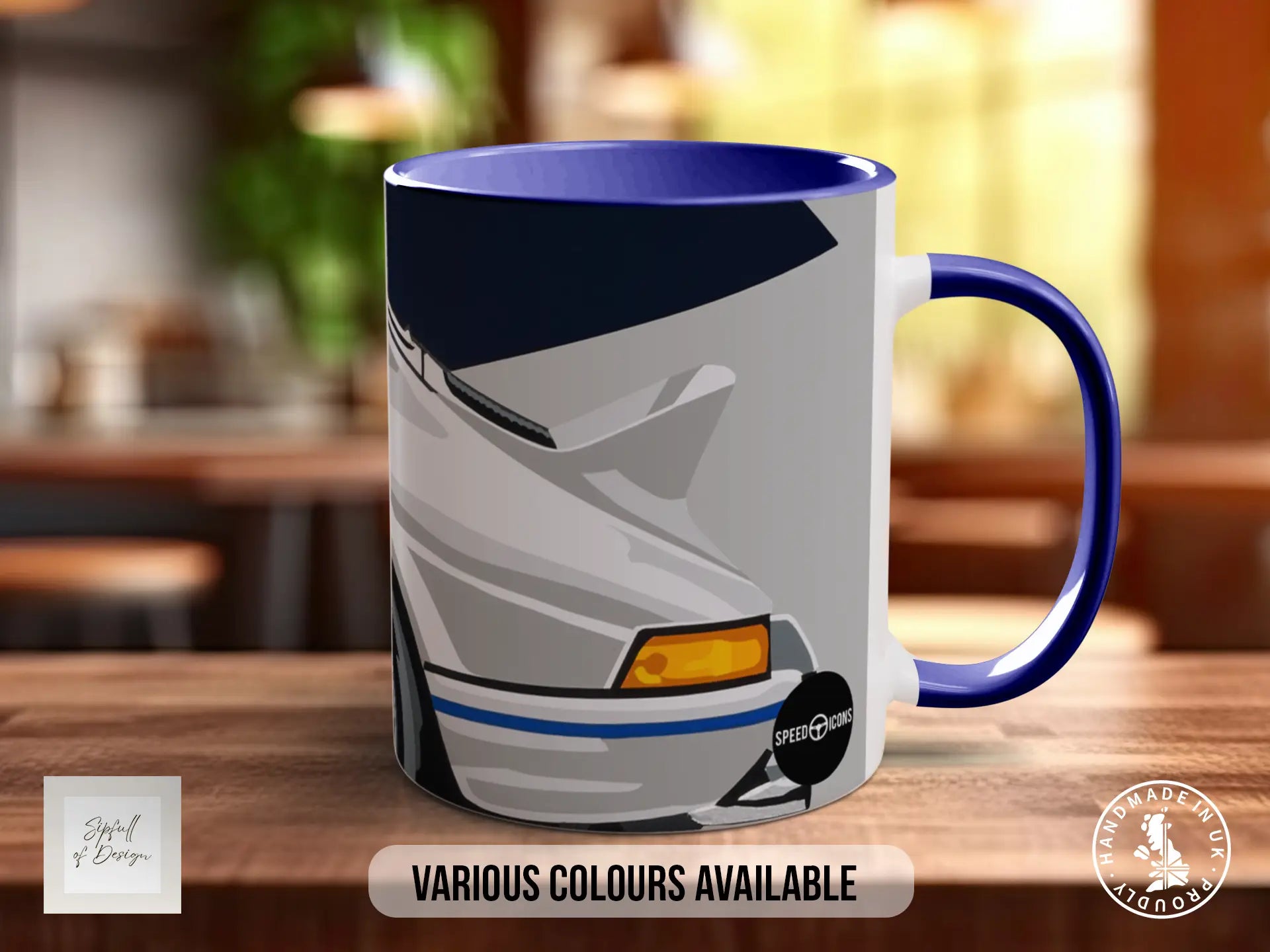 A mug with a graphic design of a car on it, placed on a wooden surface.
