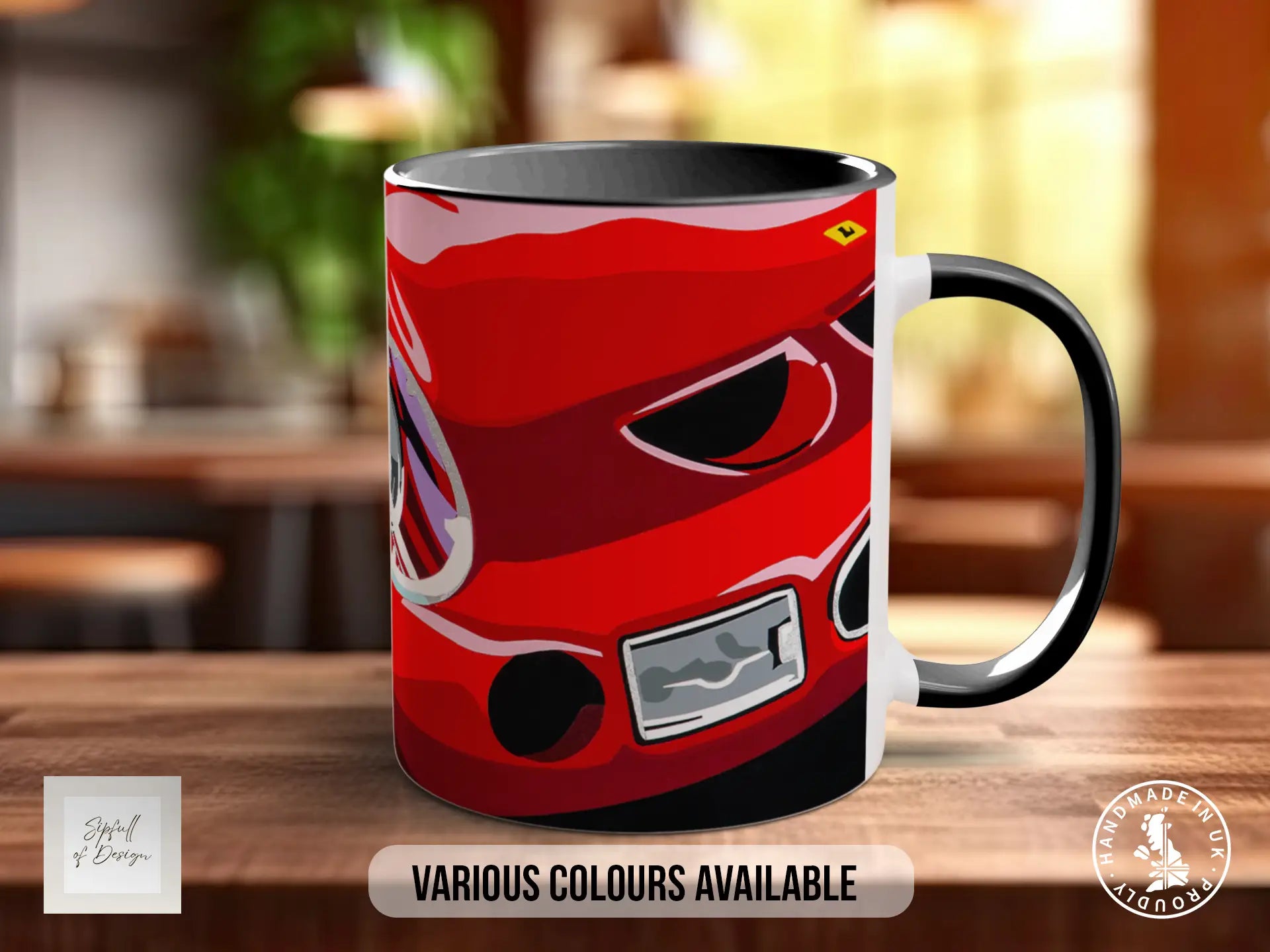 A red and black mug with a graphic of a car on it, placed on a wooden surface.