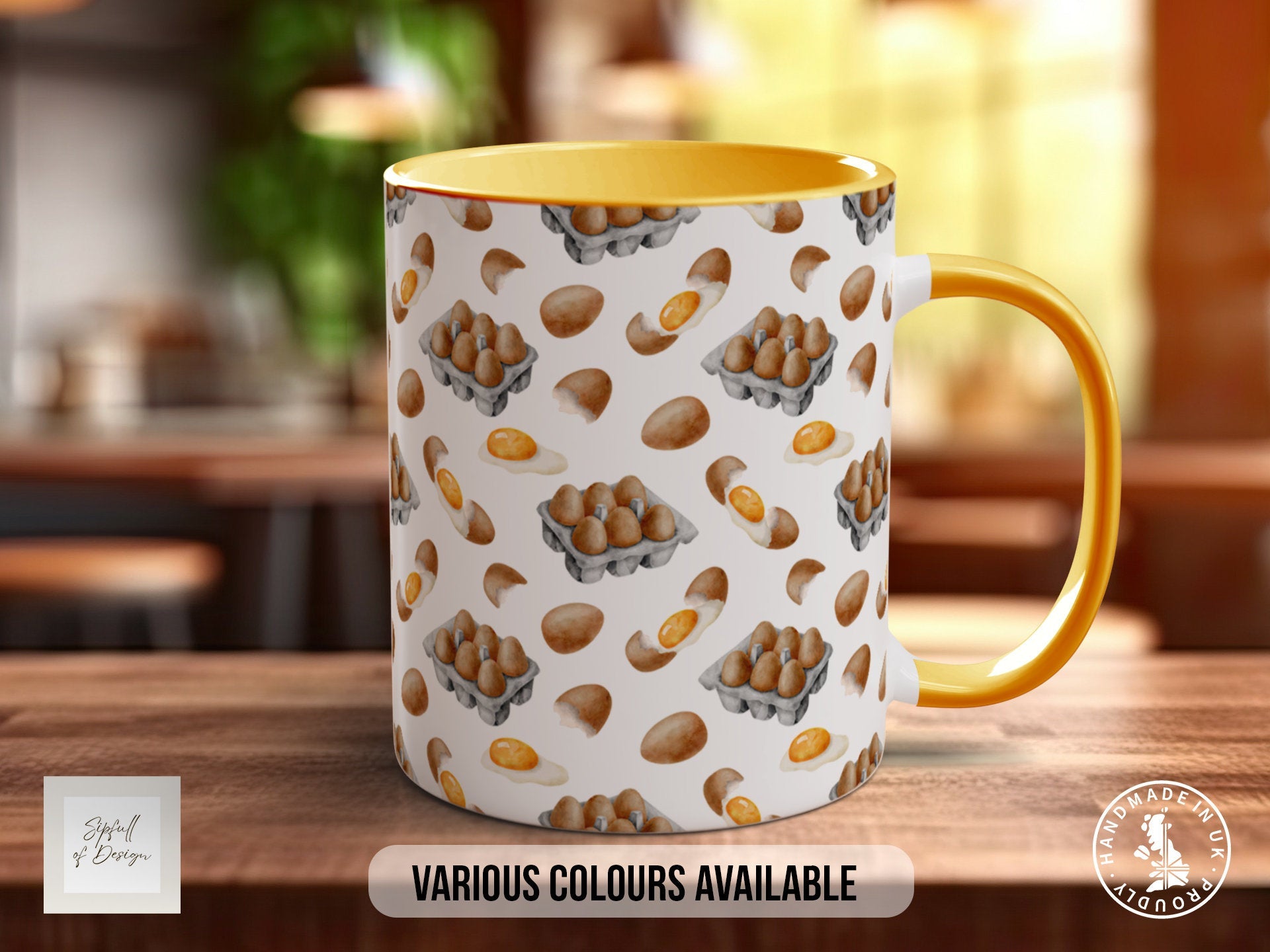a yellow and white coffee mug sitting on top of a wooden table