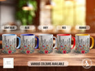 a group of four coffee mugs sitting on top of a wooden table