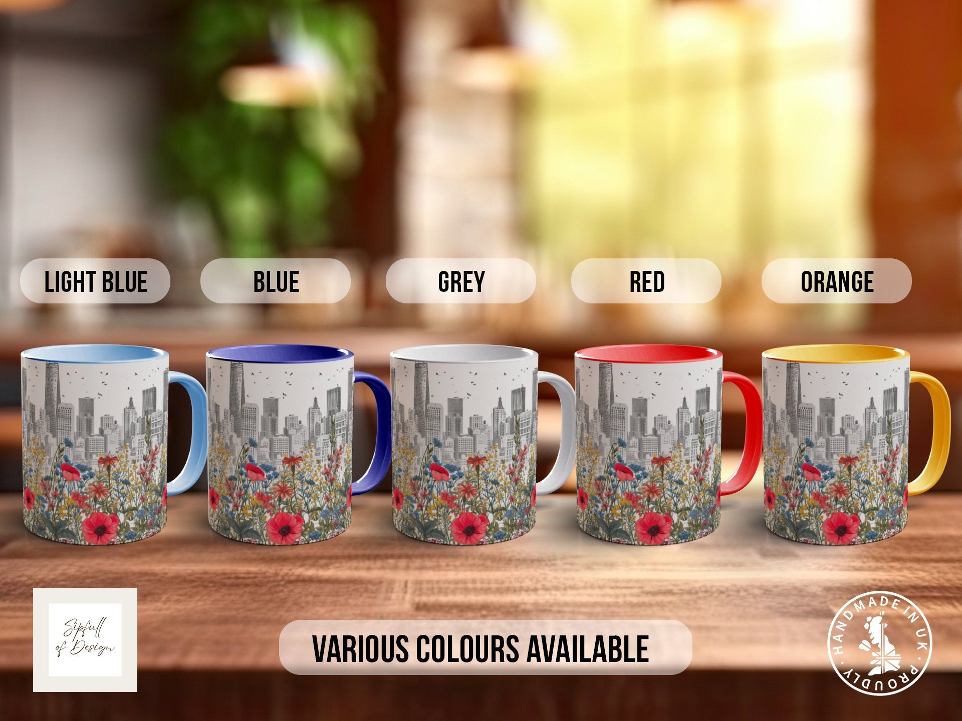a group of four coffee mugs sitting on top of a wooden table