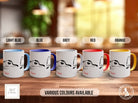 a group of coffee mugs sitting on top of a wooden table