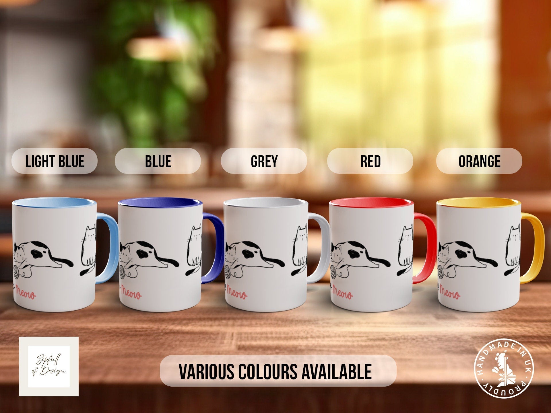 a group of coffee mugs sitting on top of a wooden table
