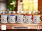 a group of four coffee mugs sitting on top of a wooden table
