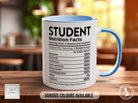 a blue and white coffee mug sitting on top of a wooden table