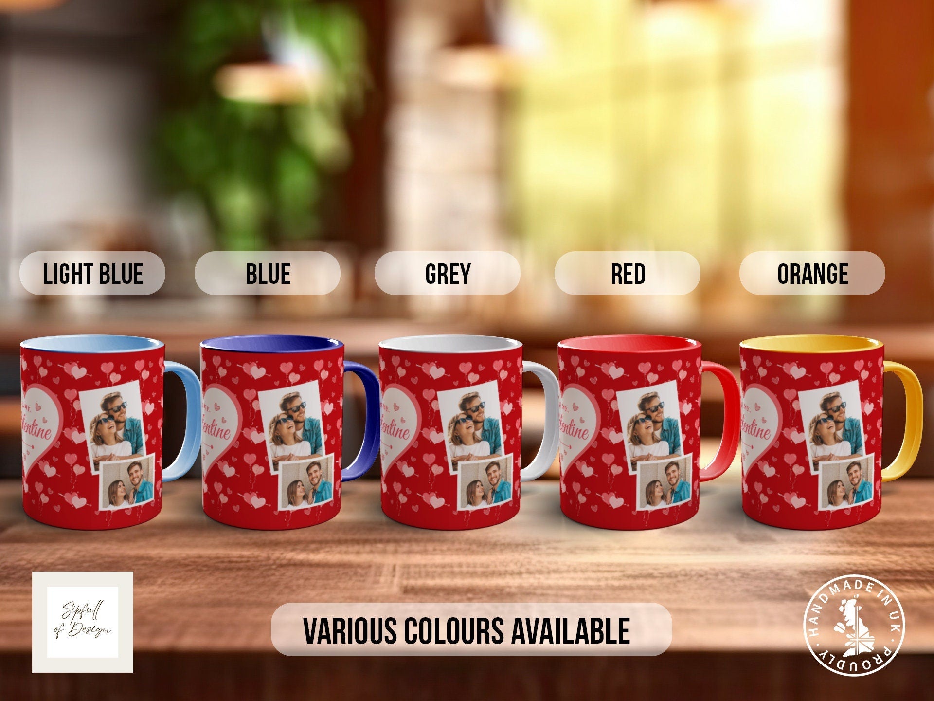 a group of four coffee mugs sitting on top of a wooden table