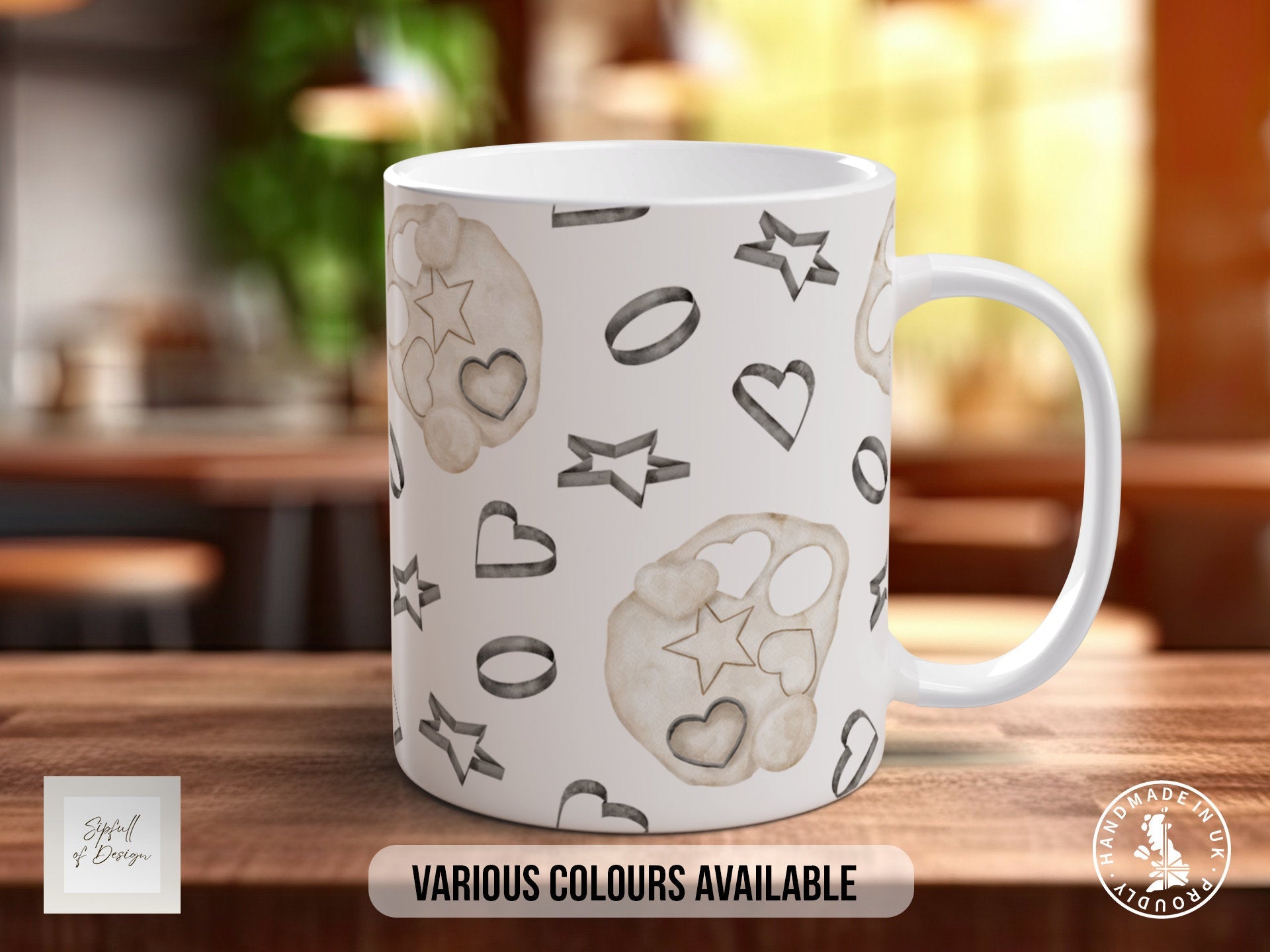 a white coffee mug with various designs on it