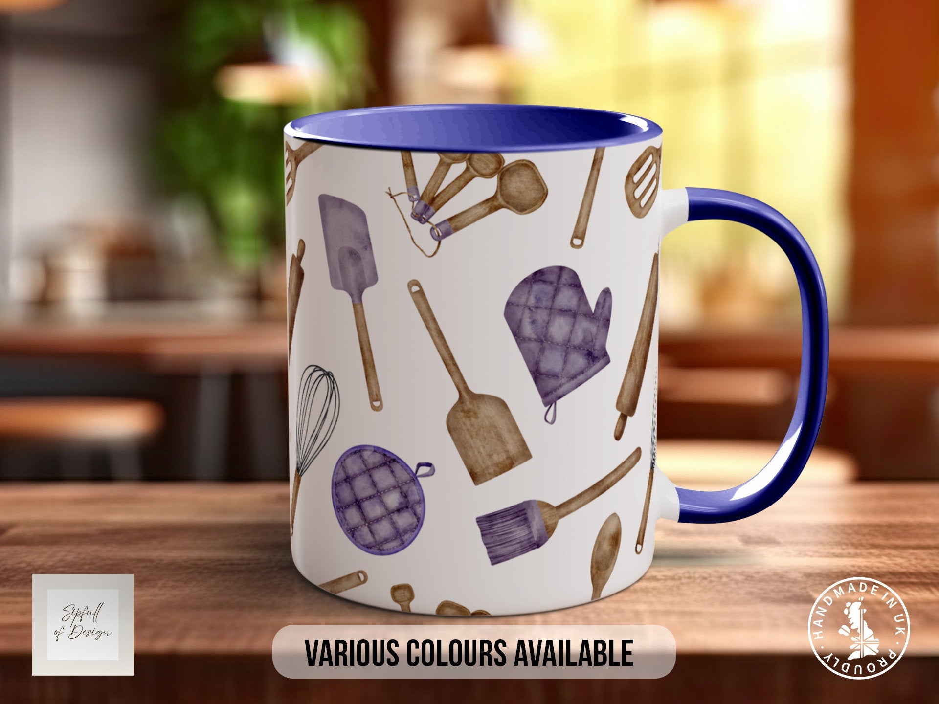 a blue and white coffee mug sitting on top of a wooden table