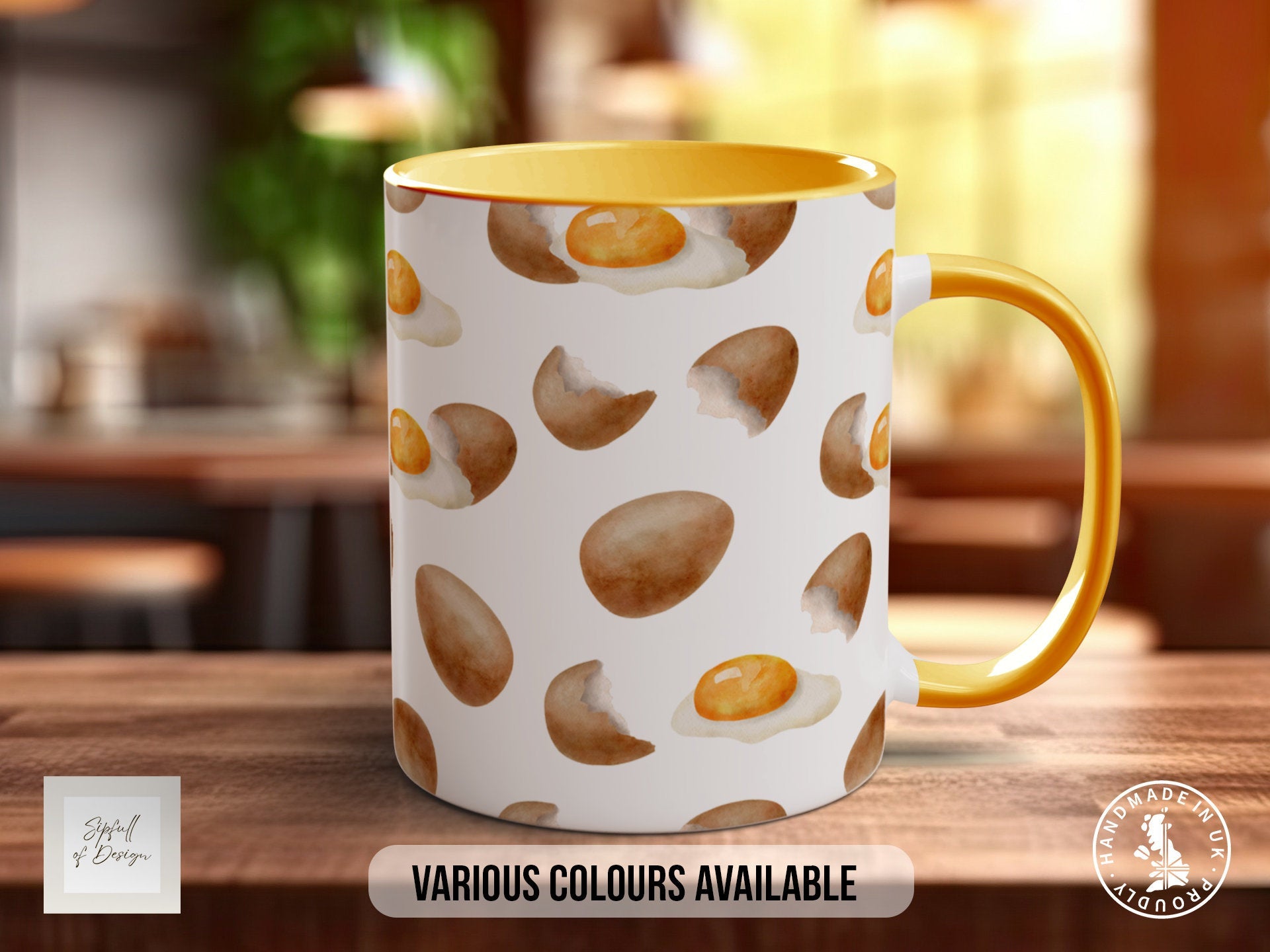 a yellow and white coffee mug sitting on top of a wooden table
