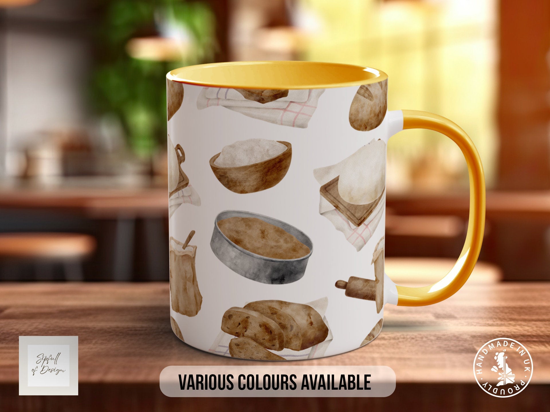 a yellow and white coffee mug sitting on top of a wooden table