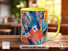a colorful coffee mug sitting on top of a wooden table