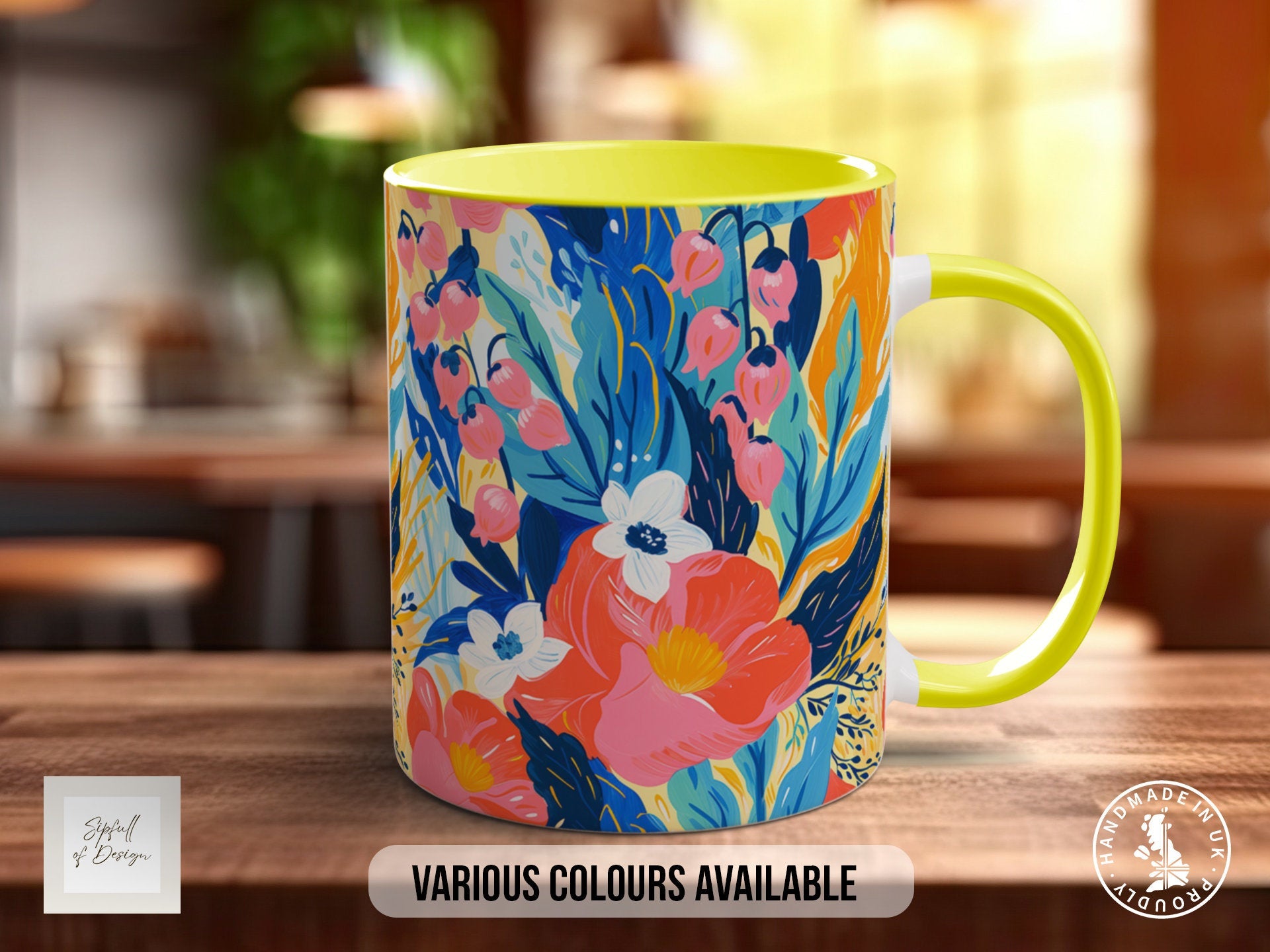 a colorful coffee mug sitting on top of a wooden table