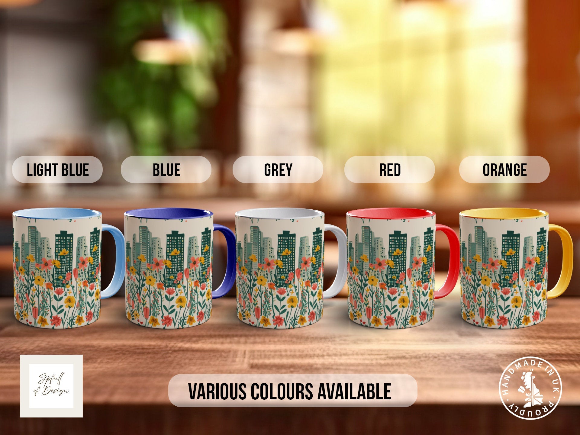 a group of four coffee mugs sitting on top of a wooden table