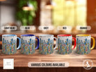 a group of four coffee mugs sitting on top of a wooden table