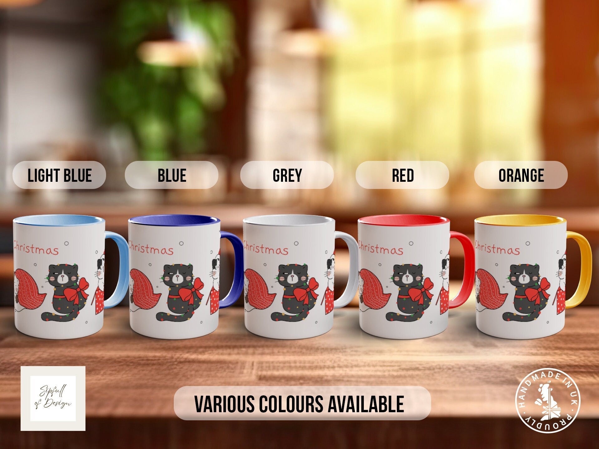 a set of four coffee mugs sitting on top of a wooden table