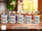 a group of five coffee mugs sitting on top of a wooden table