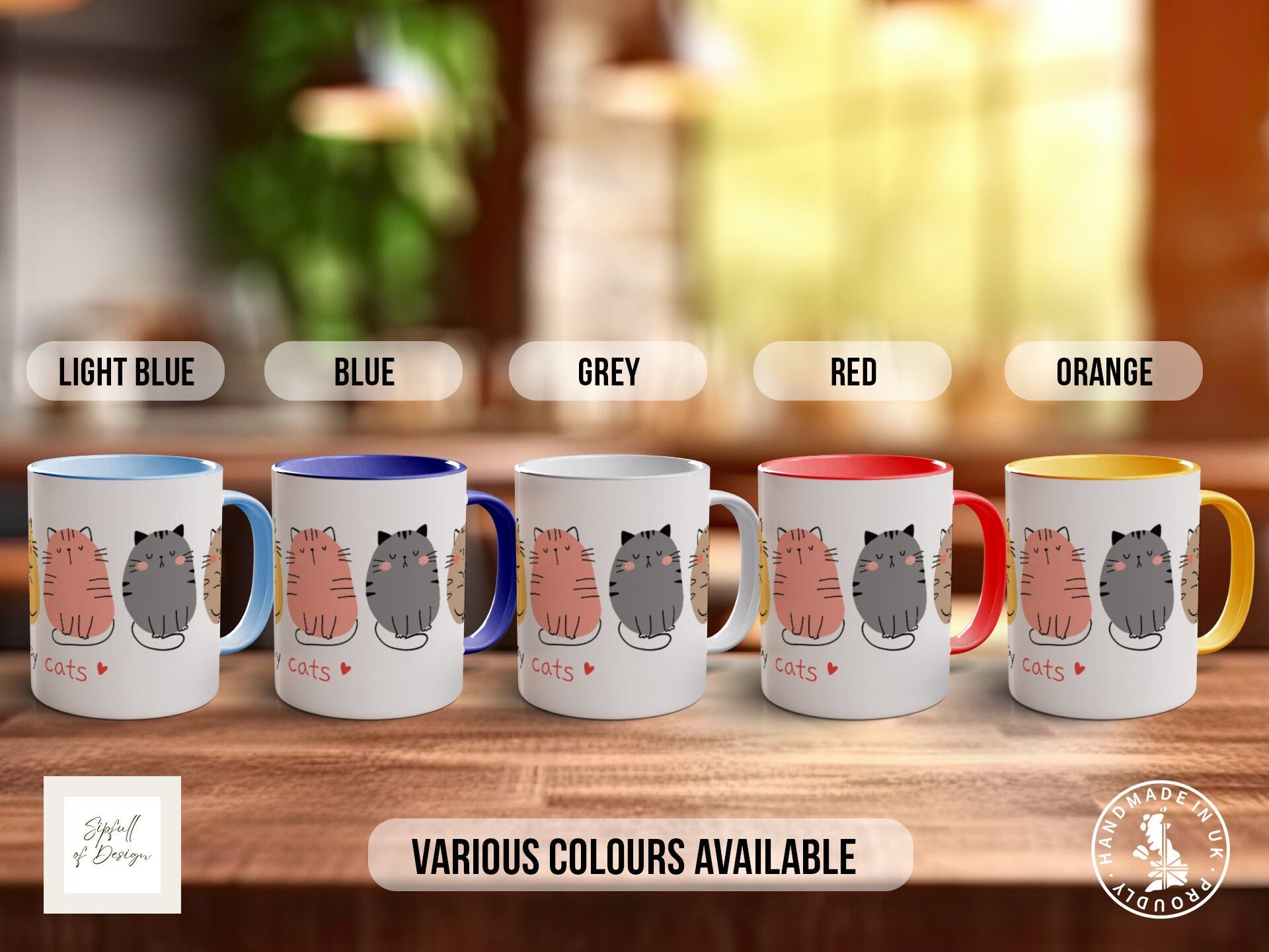 a group of five coffee mugs sitting on top of a wooden table